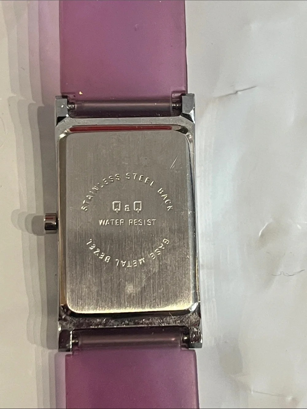 G& G watch with purple rubber band, good cond